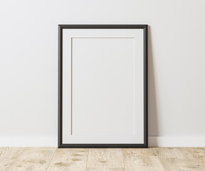 Blank blackframe with mat on wooden floor with white wall, 3:4 ratio, 30x40 cm, 18x24 inches, poster frame mock up, 3d rendering