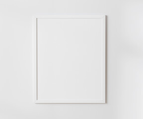 White blank frame on white wall mockup, 4:5 ratio - 40x50 cm, 16 x 20 inches, poster frame mockup, 3d rendering