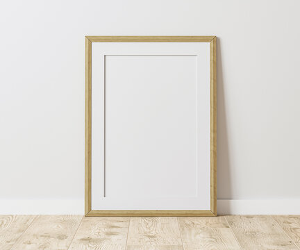 Blank wooden frame with mat on wooden floor with white wall, 3:4 ratio, 30x40 cm, 18x24 inches, poster frame mock up, 3d rendering