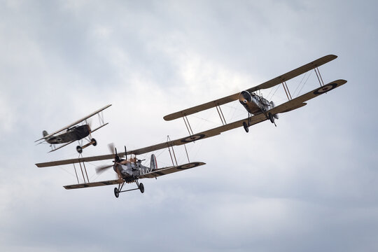 Avalon, Australia - February 27, 2015: Bristol F.2 Fighter (replica) biplane fighter and reconnaissance aircraft of the First World War flying in formation with a Royal aircraft factory R.E.8.