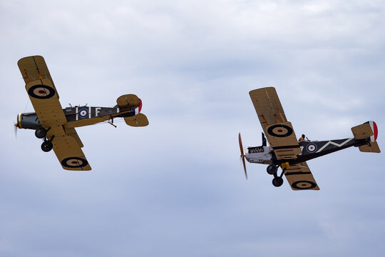 Avalon, Australia - February 27, 2015: Bristol F.2 Fighter (replica) biplane fighter and reconnaissance aircraft of the First World War flying in formation with a Royal aircraft factory R.E.8.