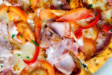 pizza with different ingredients pepper, cheese, sausage and green spices