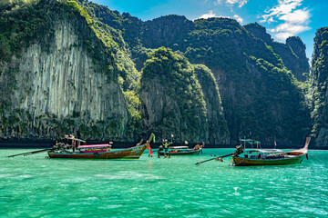 Fototapeta na wymiar Pileh Lagoon, lots of boats, Thailand