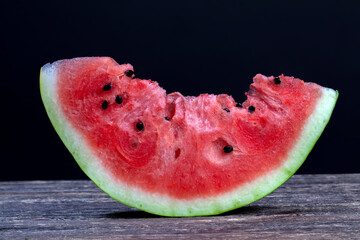 sliced red ripe watermelon during meals
