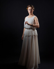 An ancient heroine, a young woman in the image of an ancient Greek goddess or muse. A noble heroine...