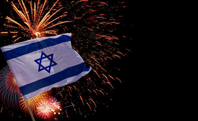 Holiday background with Israeli flag and firework display At Night. Independence Day. Concept of...