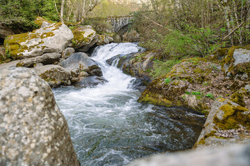 Fototapeta premium Waterfall at Madriu Perafita Claror Valley in Andorra, UNESCO world heritage site.