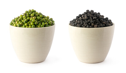 green raw and dried black peppercorns, spicy and seasoning ingredient in cup isolated on white background, closeup