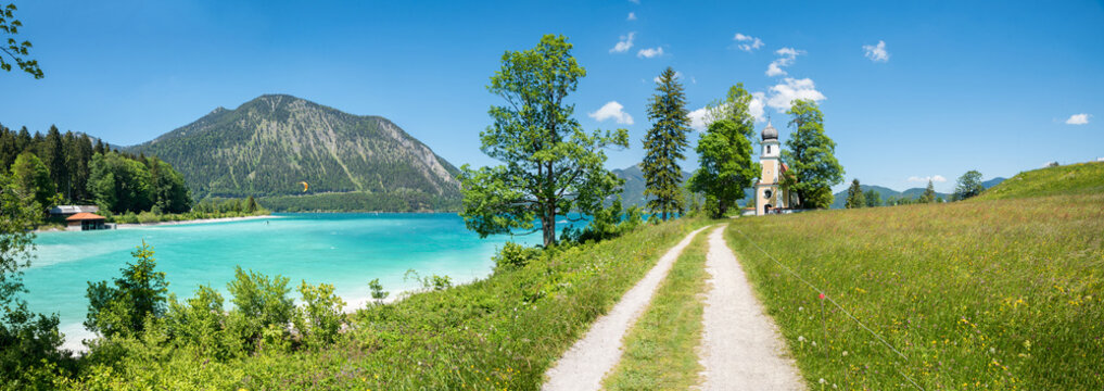 turquoise lake Walchensee, hiking trail peninsula Zwergern, view to herzogstand mountain bavaria