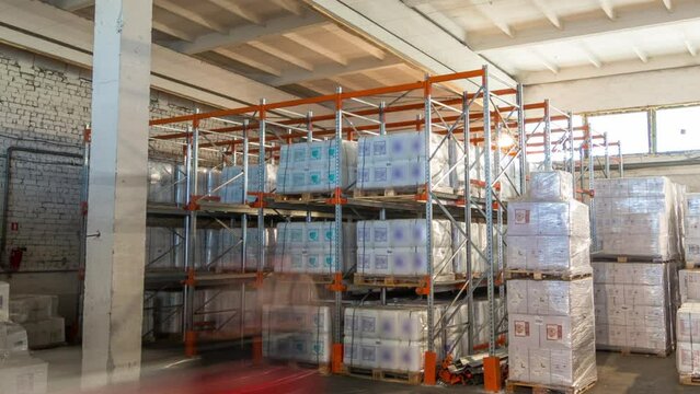 Forklift loader and cargo boxes storing at warehouse timelapse hyperlapse