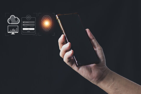 cyber security concept man's hand using a smartphone to the system through the fingerprint scanner Store data into online Cloud Data storag for security.