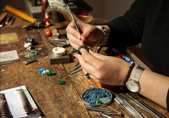 Goldsmith at work in his workshop.