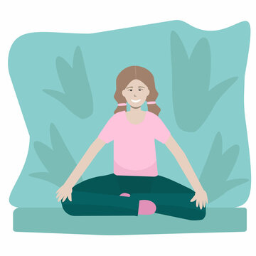 Smiling girl doing yoga and meditating
