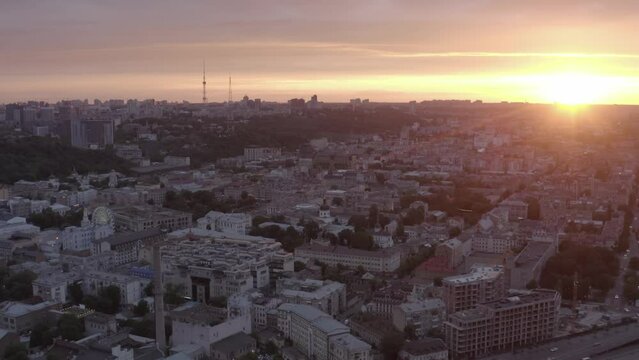 Podol is an old district of the city of Kyiv. Sunset. Summer. Roofs of houses. Aerial. Сity ​​skyline