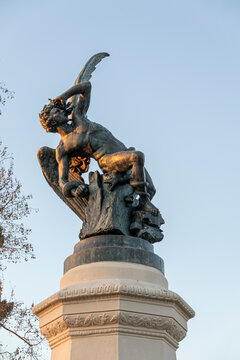 Madrid, Spain. The Fuente del Angel Caido (Monument of the Fallen Angel), a fountain located in the Buen Retiro Park