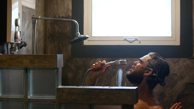 A man takes a shower and singing