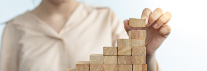 Arrange the wooden blocks into steps, higher the marketing strategy the more effort is required,...