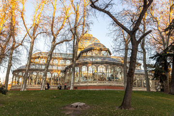 Madrid, Spain. The Palacio de Cristal del Retiro (Retreatment Park Glass or Crystal Palace), a conservatory located in Buen Retiro Park, part of Reina Sofia Museum - obrazy, fototapety, plakaty