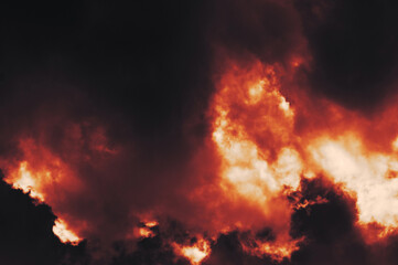 Fototapeta na wymiar The red sky background looked like smoke and fire. bomb Violent.