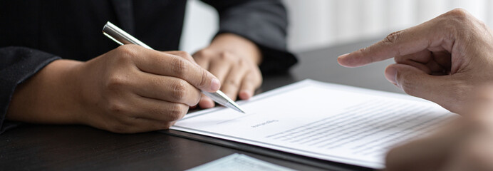 Businessmen give dollars to bribe employees in signing contracts to buy illegal land and real estate, Business fraud and social injustice, corruption and bribery concept.