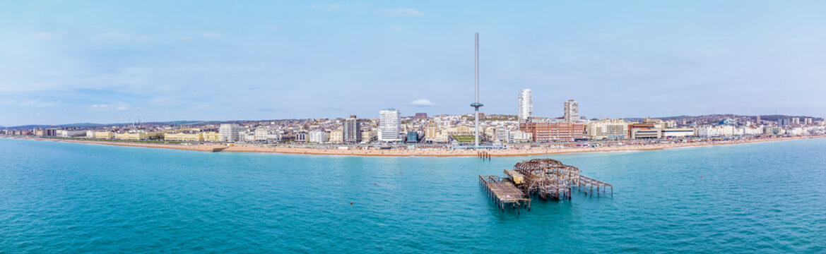 An aerial panorama view across the seashore at Brighton. UK in early summertime