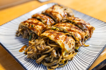 Fry noodle omelet in street market in Taiwan