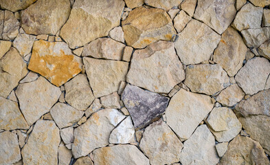 beige natural stone texture wall Seamless background.  sandstone