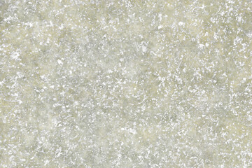 白い砂目がある淡い灰色のグランジ