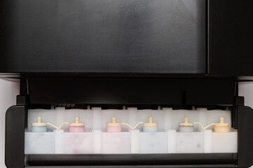 Color printer ink tank. Refilling ink cartridges.Continuous ink supply system.