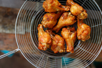 Fried chicken in deep fry outdoor