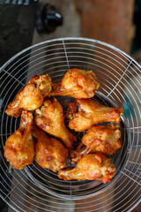 Fried chicken in deep fry outdoor