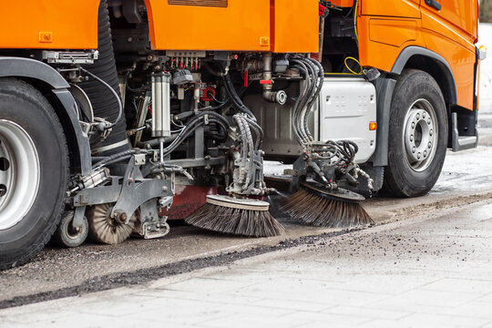Car cleans city Road. Washing Road concept. Sweep Machine Cleaning Road. Street Cleaner Service.