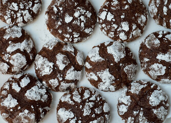 Cracked delicacies sprinkled with powdered sugar for Christmas.