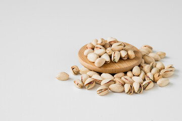 Heap of pistachios isolated on white background. Overhead