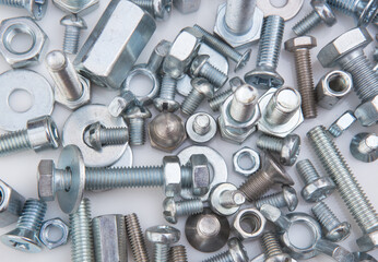 bolts and nuts on white