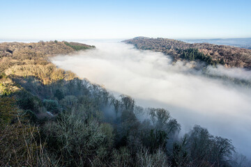 The River Wye totally obscured by mist due to a temperature inversion, seen from the viewpoint of Symonds Yat Rock, Herefordshire, England UK
