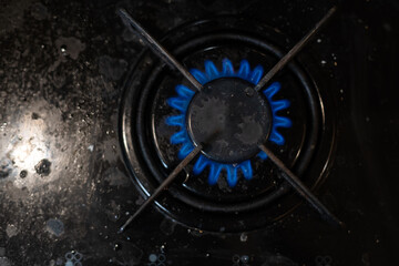dirty gas stove in the kitchen