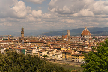 Fototapeta na wymiar View of the city of Florence in Italy with cathedral and municipal palace tower 