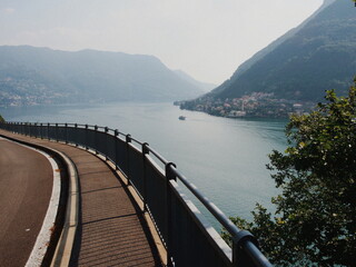 A road and a lake. Lago di Como, Italy.