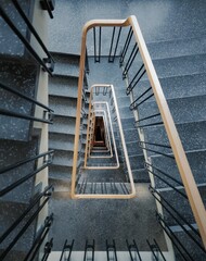 Dark blue spiral staircase 