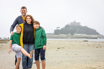 Family on holiday at St Michaels in Cornwall, England