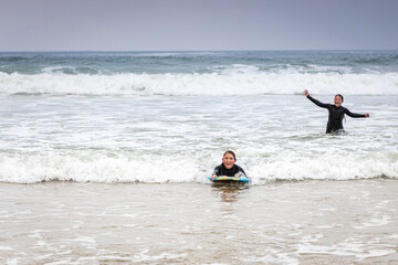 Kids at the Cornwall seaside, UK