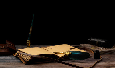 diary of ancient papyrus leaves with pen and embossed cover with ink bottle notebook and black...