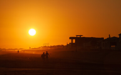 Long shot of a sunset beach