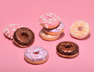 Fototapeta na wymiar donuts sweet desert on pink background