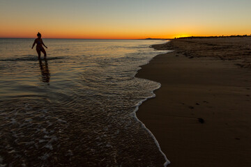Long shot of a sunset beach
