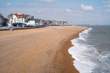 The beach at Deal, Kent, uk seen from the pier looking along the coast. - 502248960