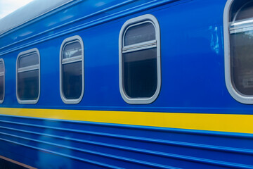 Ukrainian train wagon. Modern electric train locomotive. Fast traveling. Ukrainian refugees...