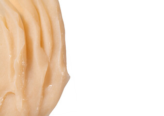 Hair conditioner cream swatch smear on white background. Yellow cosmetic lotion moisturiser sample closeup. Body care balm, retinol serum, shampoo wavy texture. Skincare mask, creamy cleanser product