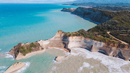 Fototapeta na wymiar Cape on the island of Corfu from above. Aerial photography of the landscape from a drone. Beautiful views of Greece and the sea.